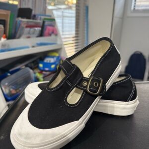 Vans Kids Black and White Slip-On Sneakers